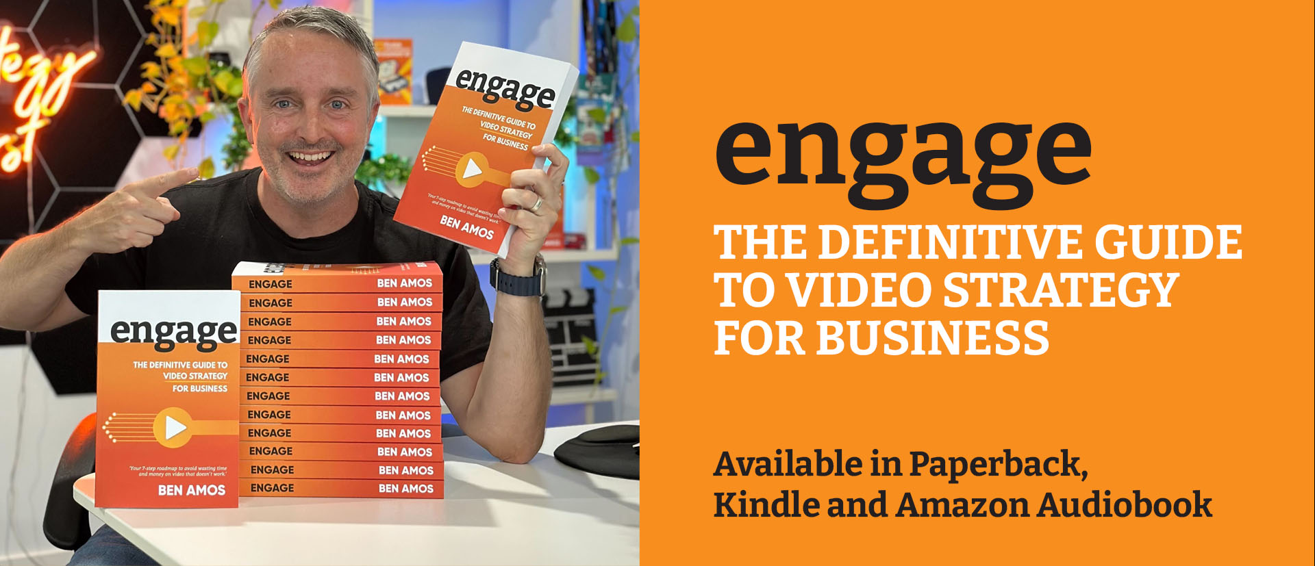 ENGAGE book web 1920px button-1 Ben Amos holds a printed copy of his book